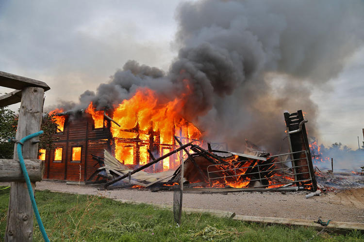 Fire brigade battles barn blaze by Baden