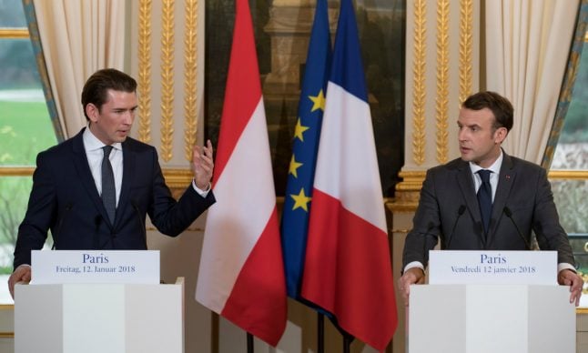 Austria’s leader during France visit: ‘Judge us on our actions’
