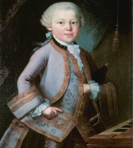 <em>A young Mozart, presumably about to have his mouth washed out with soap. Image: Wikicommons</em>