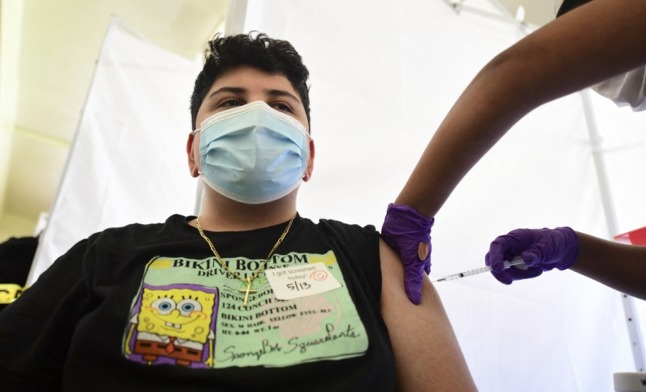Children in the US are already receiving vaccinations against the coronavirus (Photo by Frederic J. BROWN / AFP)