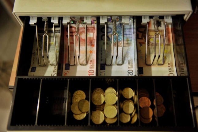 A look inside the average Austrian's wallet. Photo: ARMEND NIMANI / AFP