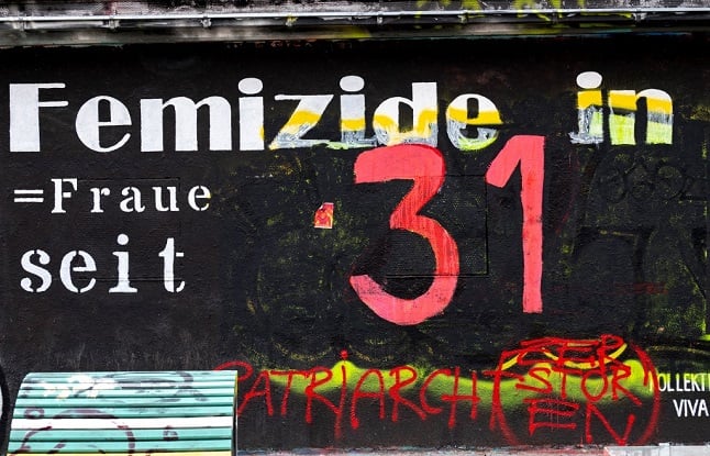 The number '31' is seen on a wall commemorating the number of femicides in Austria in 2021, in Vienna on January 17, 2022. - Painted in blood red on an improvised memorial in Vienna, the number 31 is a stark reminder of a grim toll: the women killed by men in Austria last year. After several particularly horrific cases among the killings were widely reported in the media, the issue of femicide is now squarely under the spotlight. In a small, wealthy country where violent crime generally is rare, a public debate has begun, galvanising activists and forcing politicians to act.